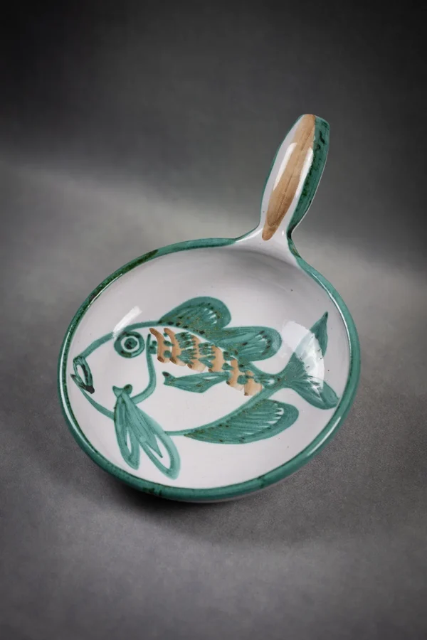 Grand caquelon en faïence émaillée Robert Picault, décor de poisson stylisé.