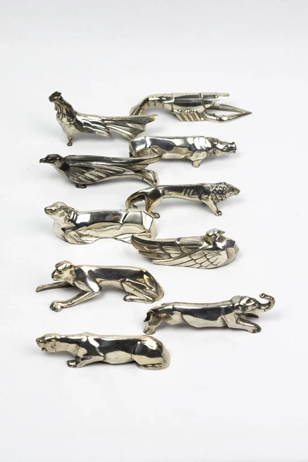 Porte-couteaux animaliers Art Déco en métal argenté – ensemble de dix modèles, dlg Sandoz